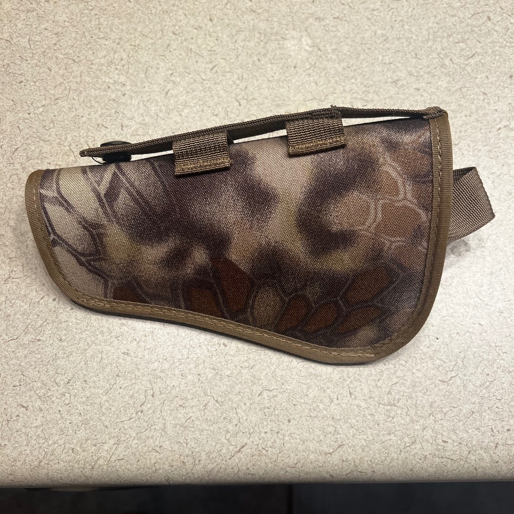 Marsupial gear bottom draw pistol holster